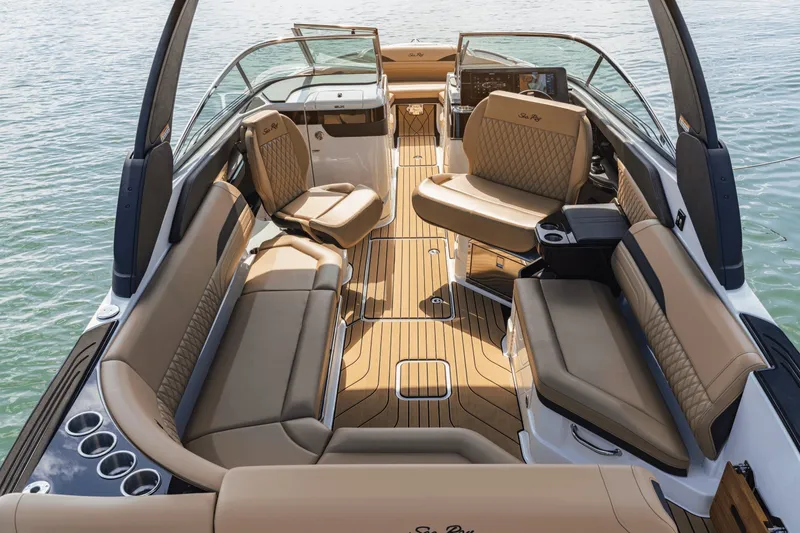 Slide: The Image of The image shows the interior of a 2027 Sea Ray SLX 280 Outboard with luxurious seating. - 15