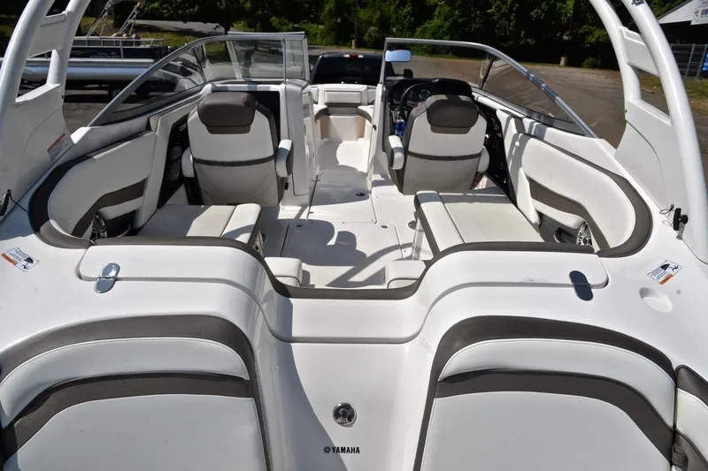 Slide: The Image of 2015 Yamaha Boats 242 Limited S interior, featuring sleek seating and modern design. - 17