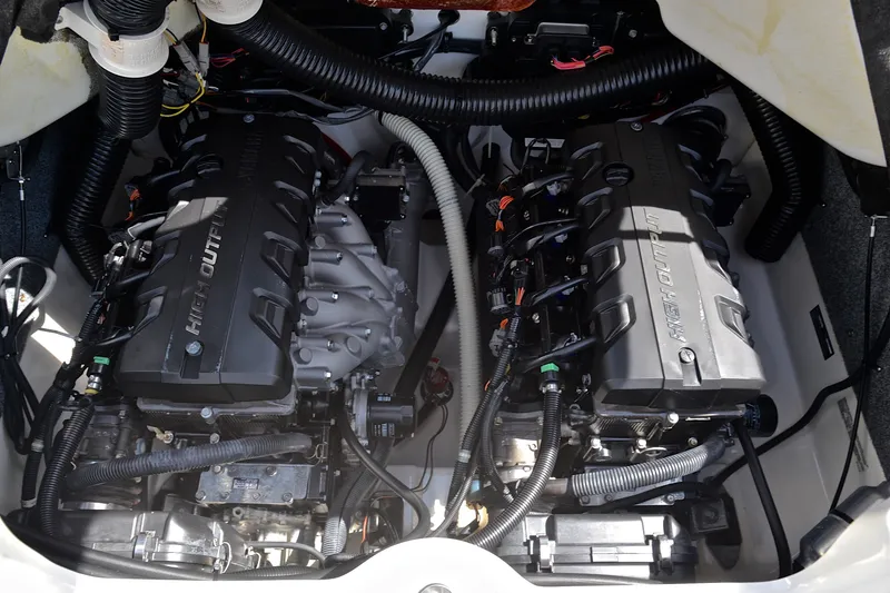 Slide: The Image of 2015 Yamaha Boats 242 Limited S engine compartment with dual high-output engines. - 27