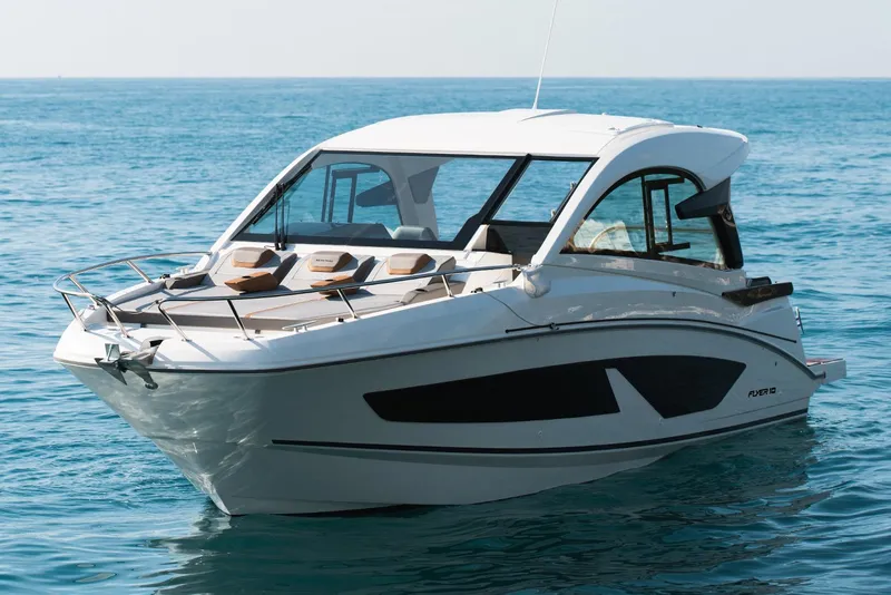 Slide: The Image of Manufacturer Provided Image: 2026 Beneteau Flyer 10 Sport Top boat on calm blue water. - 2