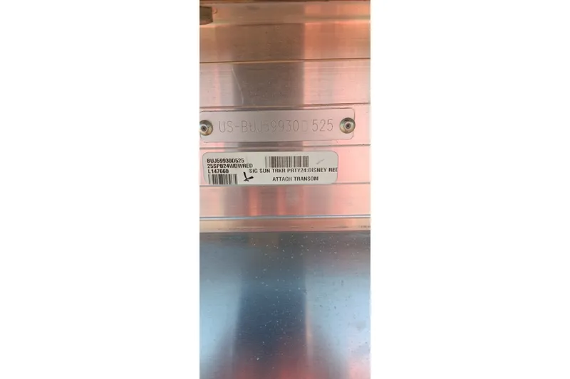 Slide: The Image of 2025 Sun Tracker Party Barge 24 DLX identification plate with serial number and barcode. - 26