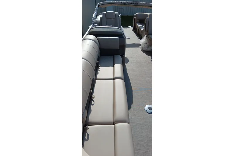 Slide: The Image of 2025 Sun Tracker Party Barge 24 DLX interior with spacious seating and modern design. - 21