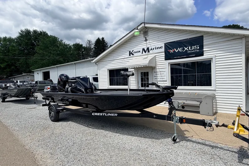 Slide: The Image of 2027 Crestliner XF 189 boat on trailer outside Knox Marine dealership. - 2