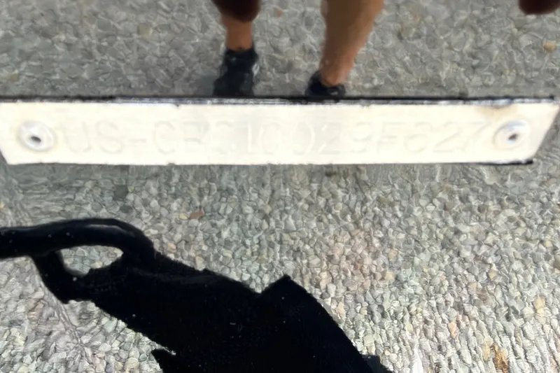 Slide: The Image of Hull identification number on 2027 Crestliner XF 189 boat, reflective surface visible. - 4