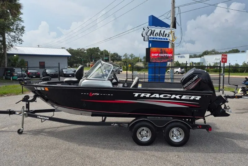 The Image of 2018 Tracker Pro Guide V-175 Combo boat on trailer at dealership. - 0