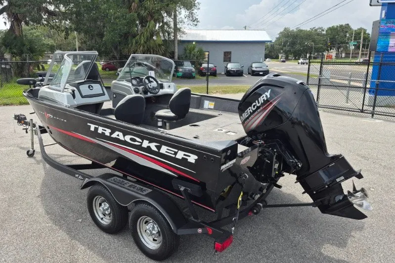 Slide: The Image of 2018 Tracker Pro Guide V-175 Combo boat with Mercury outboard motor on trailer. - 6