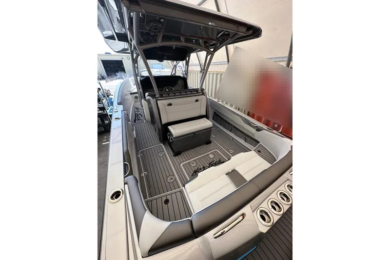 Slide: The Image of 2024 Nor-Tech 340 Sport boat interior with sleek seating and modern design. - 2