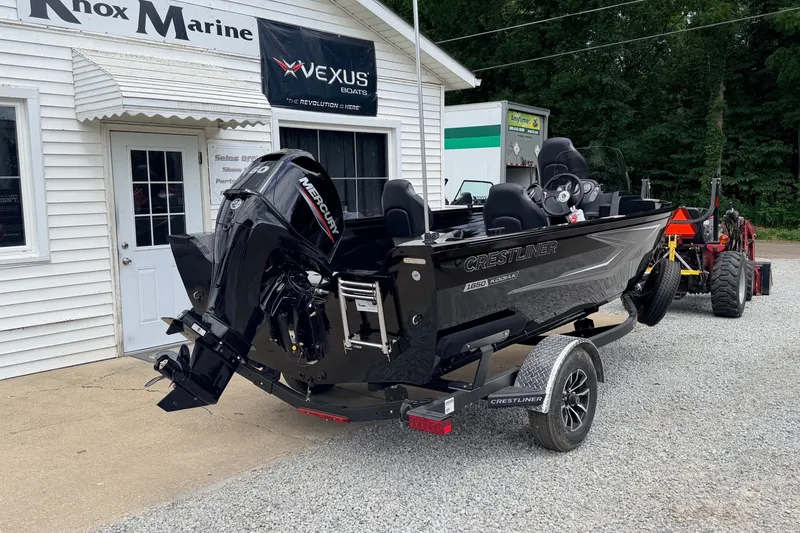 Slide: The Image of 2027 Crestliner 1650 Kodiak SC boat on trailer outside Knox Marine dealership. - 11
