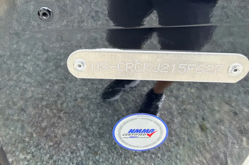 Slide: The Image of 2027 Crestliner 1650 Kodiak SC boat with NMMA certification label and serial number plate. - 4