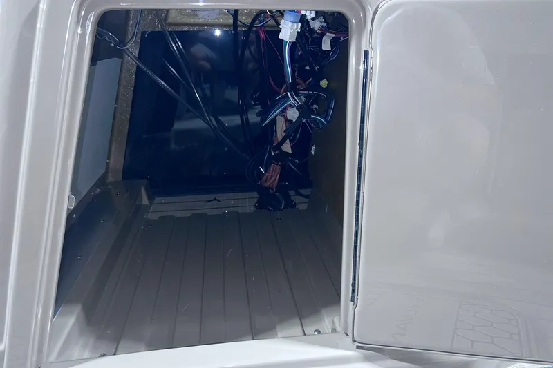 Slide: The Image of Interior view of a 2026 Sylvan X3 compartment with visible wiring. - 29