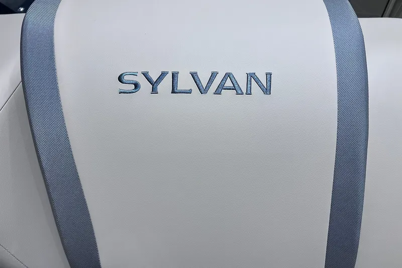 Slide: The Image of White Sylvan X3 2026 seat with blue accents and embroidered logo. - 20