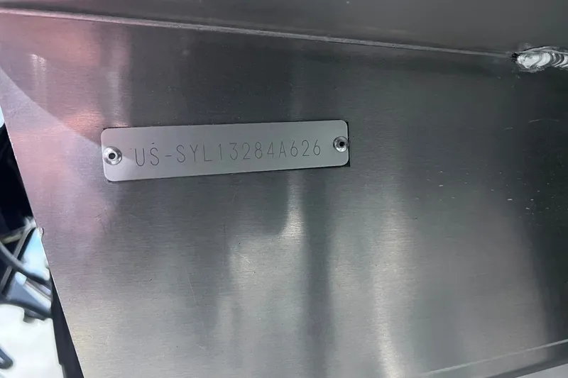 Slide: The Image of Metallic identification plate on 2026 Sylvan X3 with serial number US-SYL13284A626. - 33