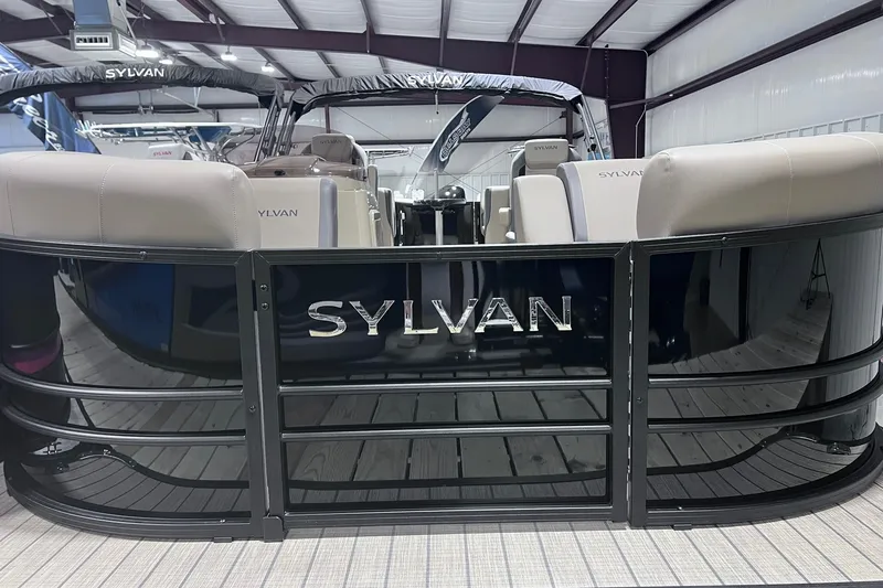 Slide: The Image of 2026 Sylvan X3 pontoon boat interior with sleek design and comfortable seating. - 6
