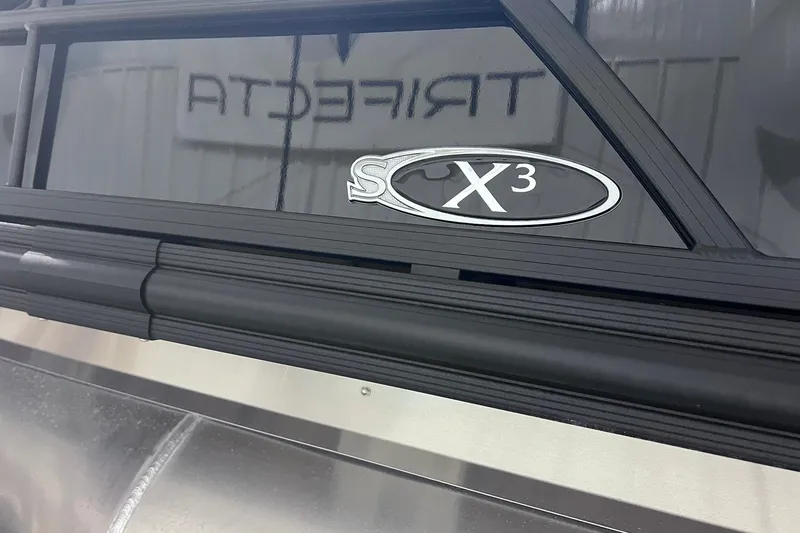Slide: The Image of 2026 Sylvan X3 logo on sleek black and silver surface. - 5