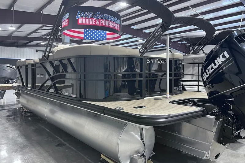 Slide: The Image of 2026 Sylvan X3 pontoon boat with Suzuki engine displayed at Lake Greenwood Marine. - 3