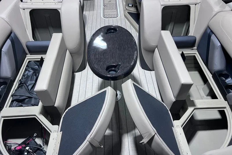 Slide: The Image of Interior of 2026 Sylvan X3 boat with seating and storage compartments. - 18