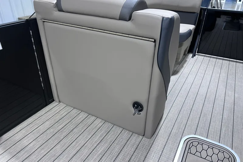 Slide: The Image of 2026 Sylvan X3 boat interior with sleek seating and modern flooring design. - 21