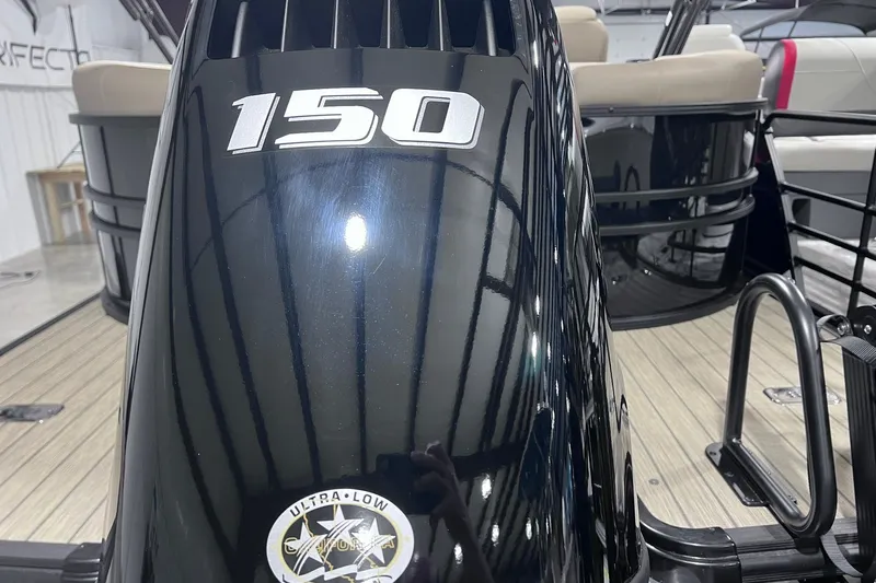 Slide: The Image of Outboard motor on 2026 Sylvan X3 boat, featuring "150" horsepower label. - 32