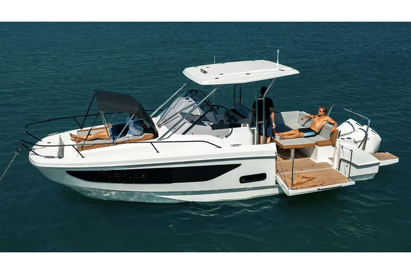 Slide: The Image of Manufacturer Provided Image: 2026 Beneteau Flyer 9 SUNdeck boat cruising with passengers relaxing on deck. - 2