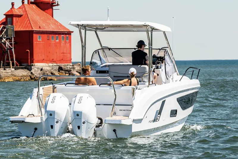 Slide: The Image of Manufacturer Provided Image: 2026 Beneteau Flyer 9 SUNdeck cruising near a red lighthouse. - 3