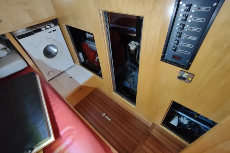 Slide: The Image of Interior of 2005 Garcia Passoa 47 yacht with washing machine and control panel. - 65