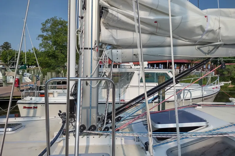 Slide: The Image of Sailboat Garcia Passoa 47, 2005 model, docked with visible rigging and sails. - 46