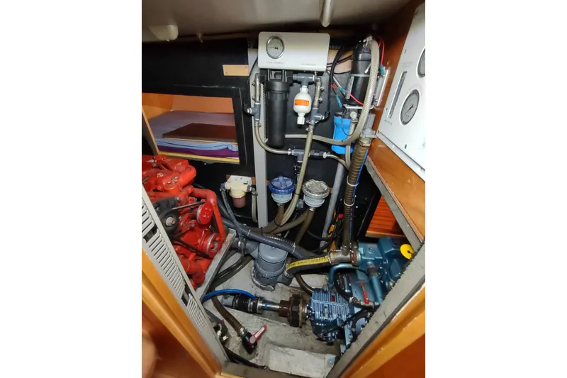 Slide: The Image of Engine room of 2005 Garcia Passoa 47 yacht, showcasing mechanical components and systems. - 67
