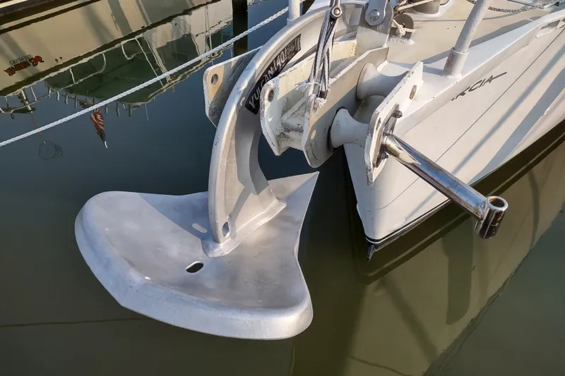 Slide: The Image of Garcia Passoa 47 sailboat anchor detail, 2005 model, docked in calm waters. - 43