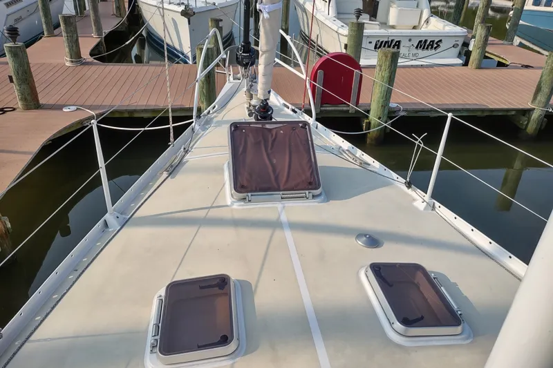 Slide: The Image of Deck view of 2005 Garcia Passoa 47 yacht docked at marina. - 51