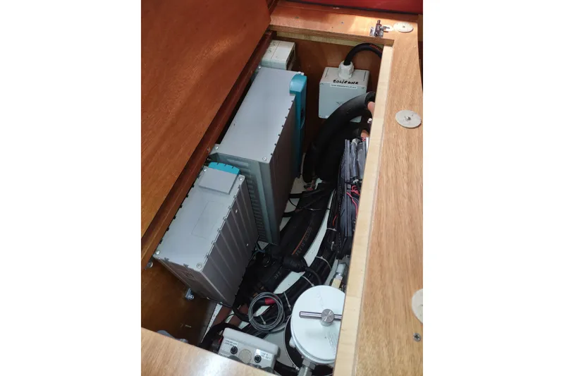 Slide: The Image of Electrical components inside a 2005 Garcia Passoa 47 yacht, featuring wiring and equipment. - 80