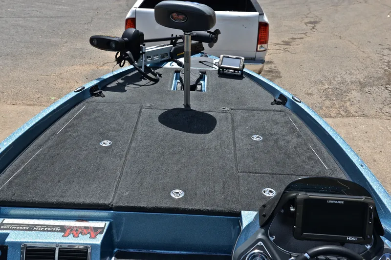 Slide: The Image of 2012 Ranger Z518 boat deck with fishing seat and electronics. - 24