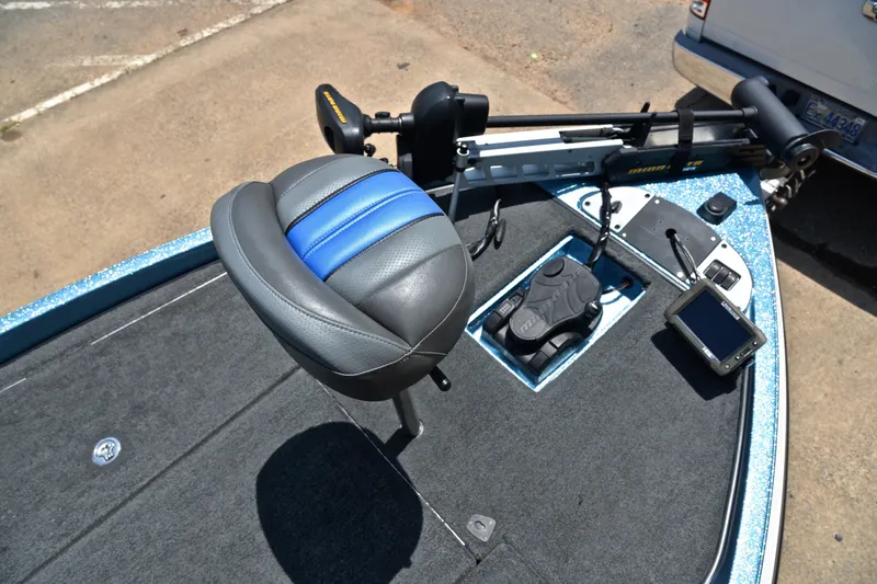 Slide: The Image of 2012 Ranger Z518 boat deck with seat, trolling motor, and fish finder. - 26