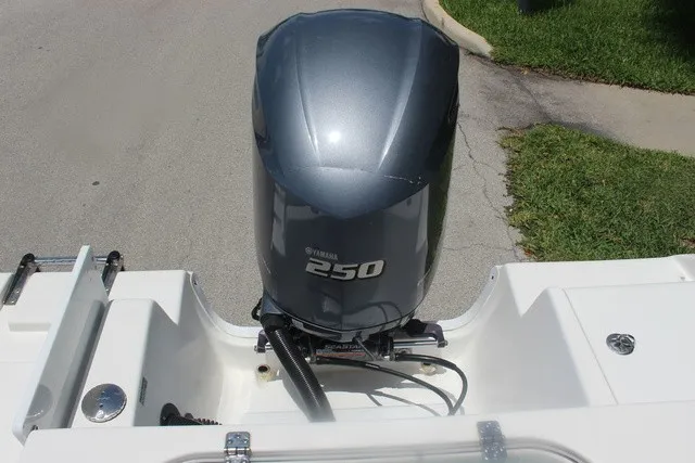 Slide: The Image of A Yamaha 250 outboard motor is mounted on the stern of a Sea Pro 219 Center Console boat. - 45