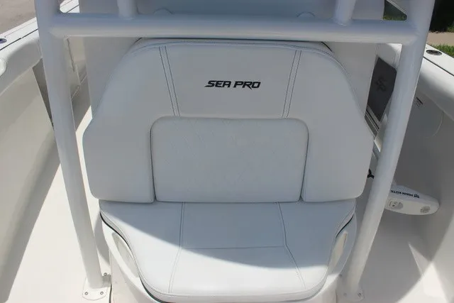 Slide: The Image of The image shows a white seat with the "Sea Pro" logo on a 2023 Sea Pro 219 Center Console. - 34