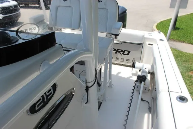 Slide: The Image of The image shows the cockpit of a 2023 Sea Pro 219 Center Console boat. - 20