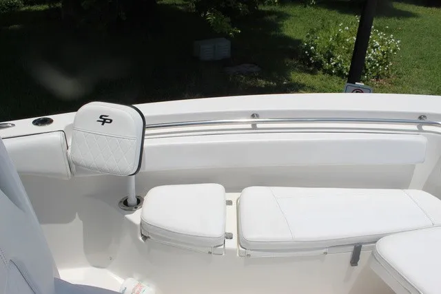 Slide: The Image of The 2023 Sea Pro 219 Center Console features a white bench seat with quilted upholstery. - 22