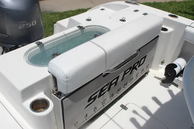 Slide: The Image of The image shows the stern of a Sea Pro 219 Center Console boat with a Yamaha 250 engine. - 11