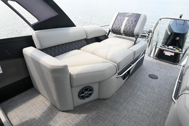 Slide: The Image of 2025 Barletta Lusso 25UCA pontoon boat interior with luxurious seating and modern design. - 31