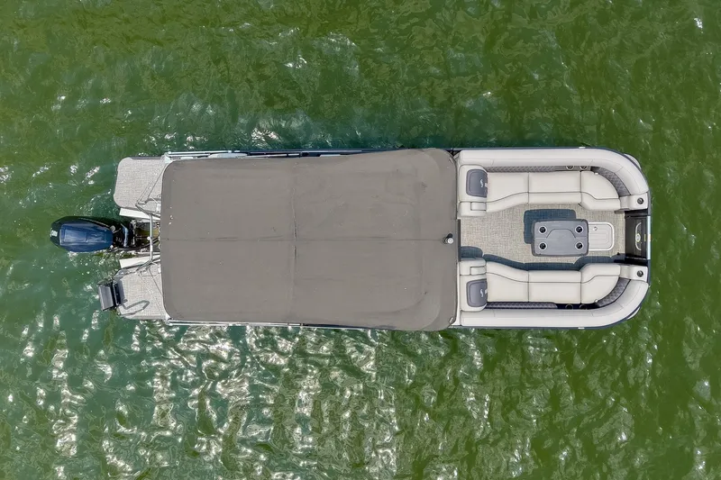 Slide: The Image of Aerial view of 2025 Barletta Lusso 25UCA pontoon boat on green water. - 58