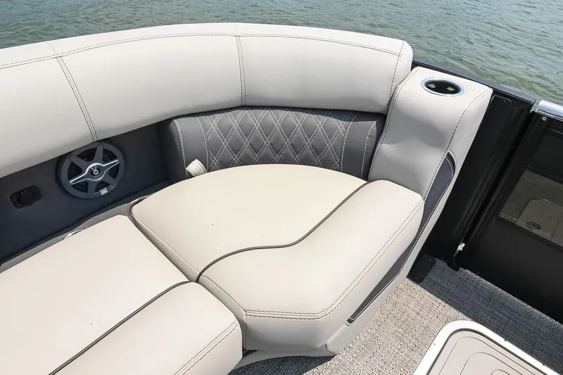 Slide: The Image of Luxurious seating on 2025 Barletta Lusso 25UCA pontoon boat with cup holder and speaker. - 46