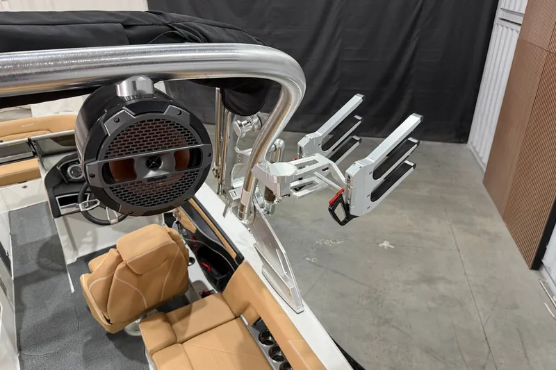 Slide: The Image of 2020 MasterCraft X22 boat interior with speaker and wakeboard rack. - 7