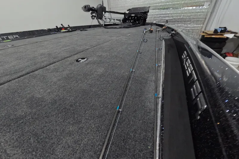 Slide: The Image of 2026 Skeeter ZXR21 SE boat deck with fishing rods and equipment. - 5