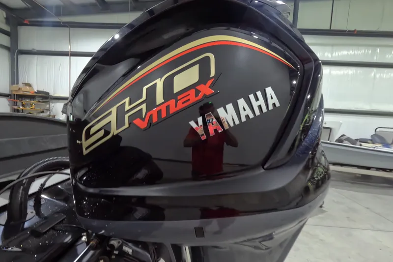 Slide: The Image of Yamaha SHO VMAX engine on 2026 Skeeter ZXR21 SE boat in a garage setting. - 22