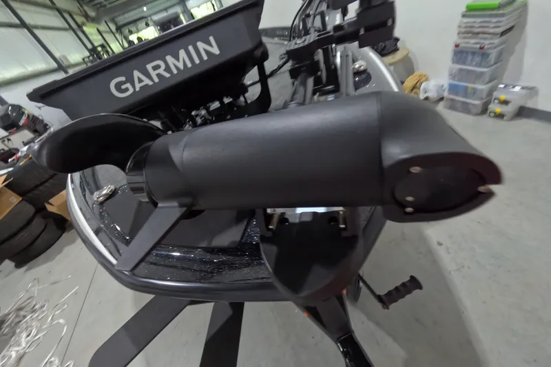 Slide: The Image of 2026 Skeeter ZXR21 SE boat with Garmin equipment in a garage setting. - 8