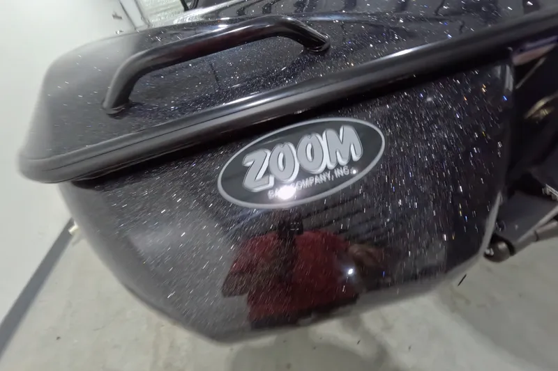 Slide: The Image of Close-up of a 2026 Skeeter ZXR21 SE boat with a Zoom logo. - 17