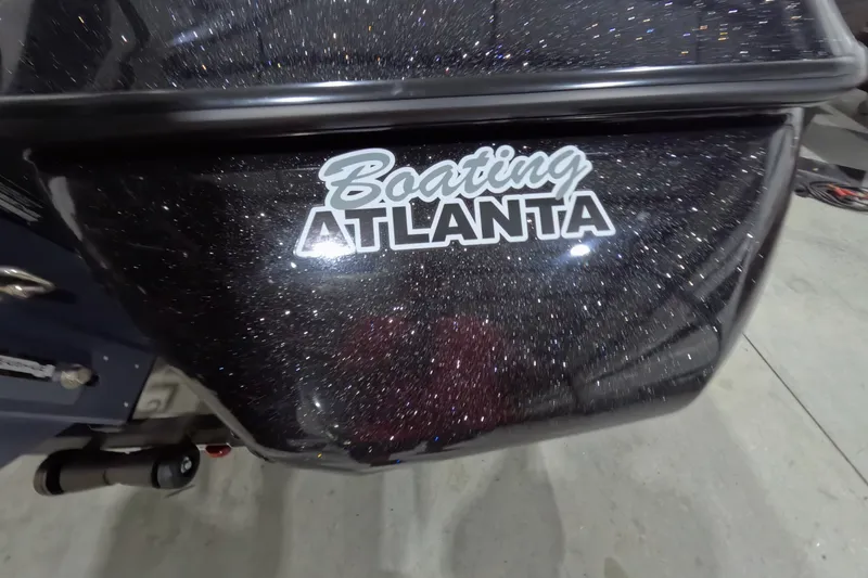 Slide: The Image of 2026 Skeeter ZXR21 SE boat with "Boating Atlanta" decal on a sparkling black surface. - 18