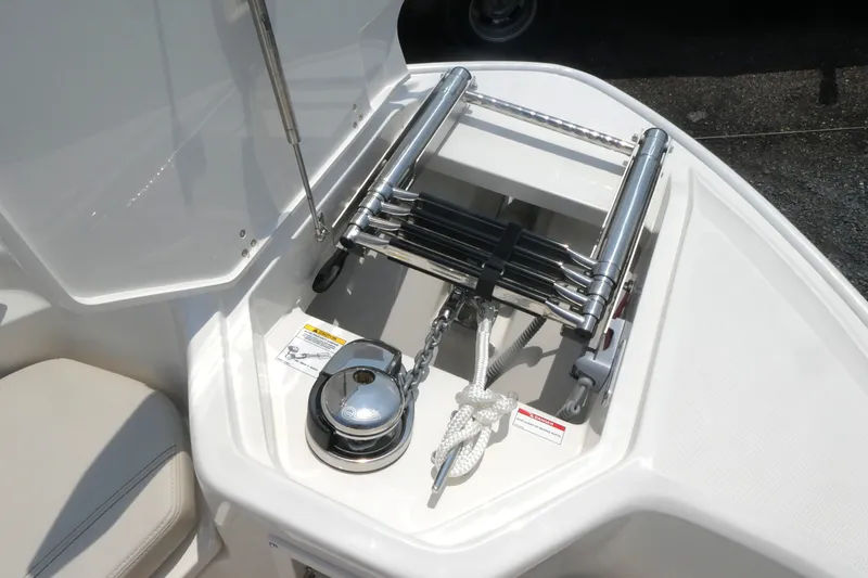 Slide: The Image of Boston Whaler 280 Dauntless 2027 boat anchor storage with ladder and rope. - 11