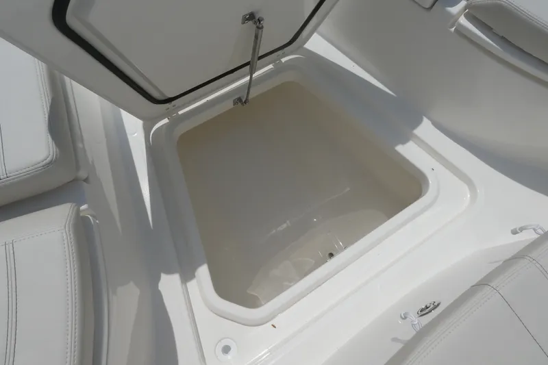 Slide: The Image of Open storage compartment on 2027 Boston Whaler 280 Dauntless boat. - 15