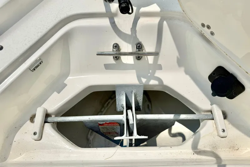 Slide: The Image of Anchor storage compartment on 2025 Key West 188 Bay Reef boat, featuring secure fittings and clean design. - 15