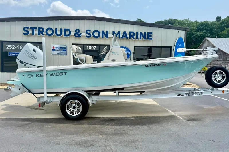 Slide: The Image of 2025 Key West 188 Bay Reef boat on trailer at Stroud & Son Marine dealership. - 7